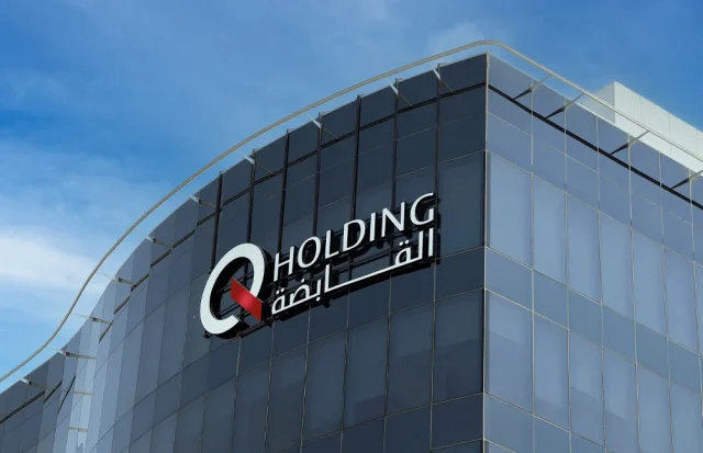 Q HOLDING ACHIEVES MAJOR MILESTONE WITH SUCCESSFUL COMPLETION OF ACQUISITION